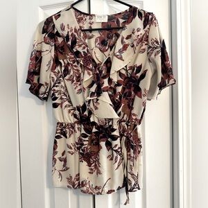 Sienna Sky, floral blouse with wrap tie. Size Small.